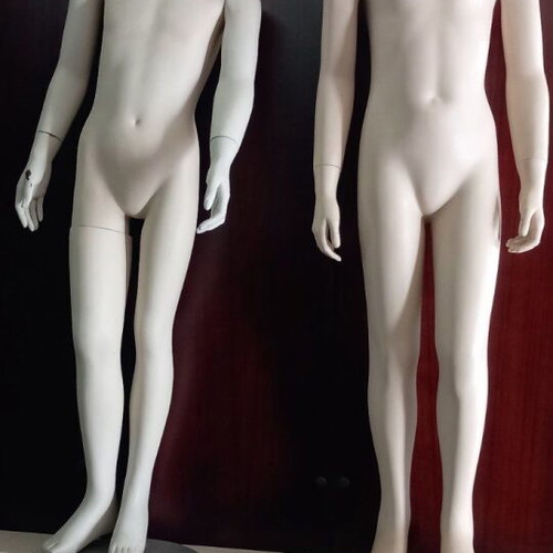 Child Display Mannequins like new, boy and girl with metal bases