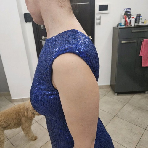 Diamond blue dress like new, open back with shoulder pads