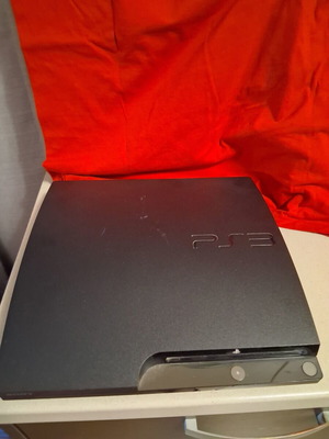 Sony Playstation 3 console with power and HDMI cables