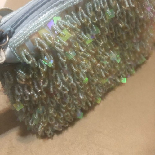 Satin blue hand bag like new with sequins