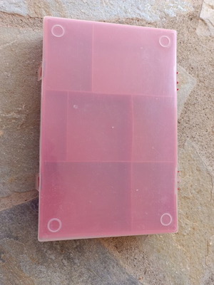 Plastic storage box used with multiple compartments for small items