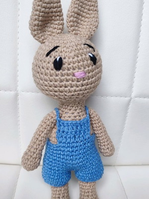Amigurumi knitted bunny new with blue overalls