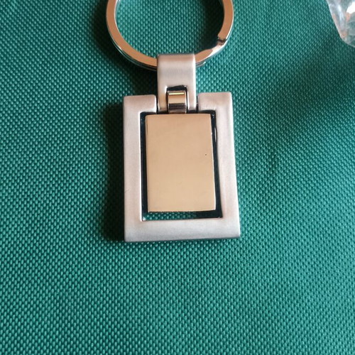 Vintage Nissan spinning keychain, New Old Stock, heavy metal 38g