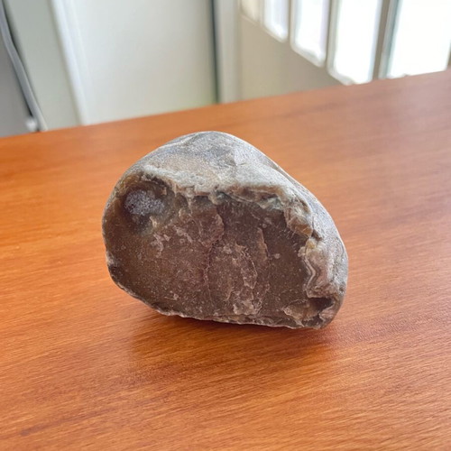 Brown flint new with smooth surface and natural texture