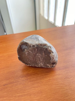 Brown flint new with smooth surface and natural texture