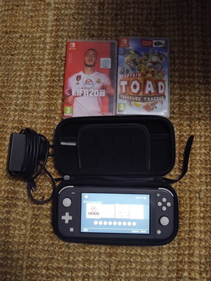 Nintendo Switch Lite like new with 2 games FIFA 20 and Captain Toad