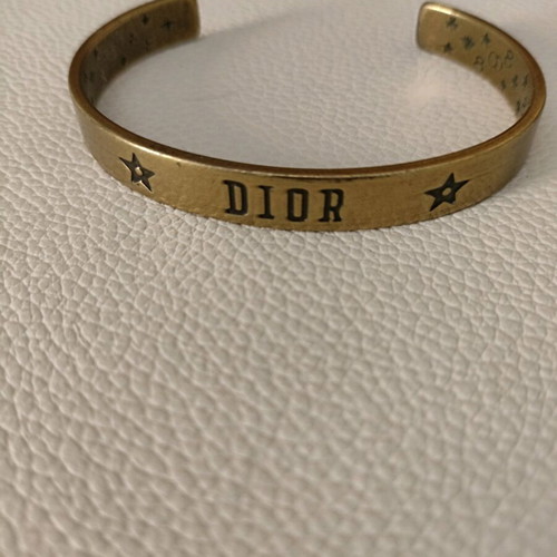 Christian Dior brass cuff bracelet like new, gold tone