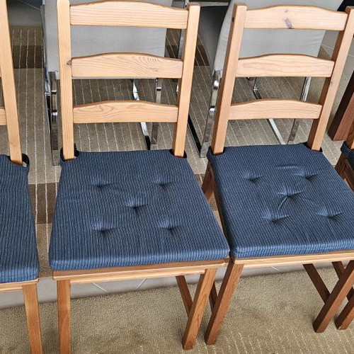 Ikea wooden chairs like new with dark blue cushions, set of four