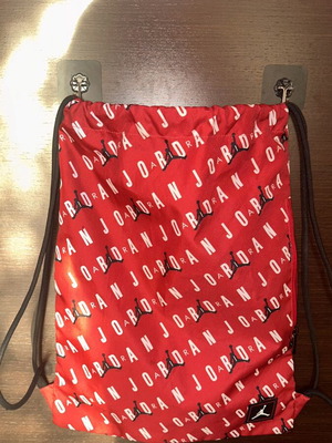 Jordan gym bag like new, red backpack
