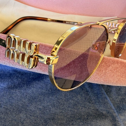 Miu Miu SMU 54ZS ZVN-70D sunglasses like new, gold frame, pink lenses