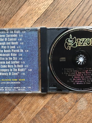 cd: Saxon - 12 metal dynamites (including demon and leather) extra 3 bonus tracks
