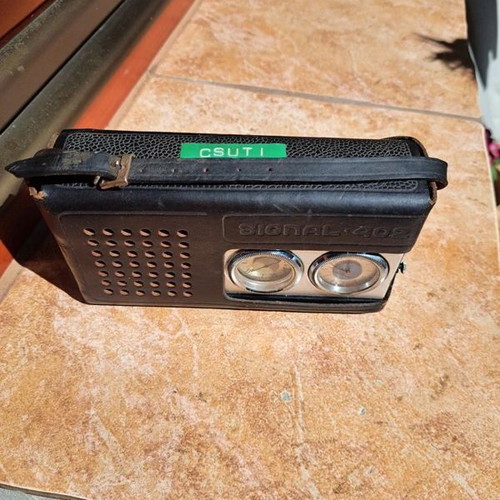 Signal 402 portable Soviet radio with clock used