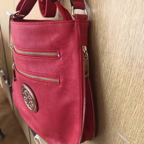 Leather handbag with zipper for expansion, like new, red