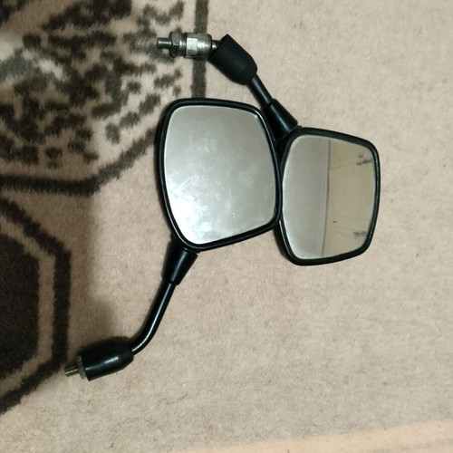 Motorcycle mirrors used, one with crack
