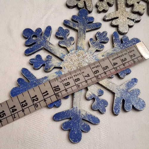 Wooden snowflake elements used, pack of 2, blue with silver glitter