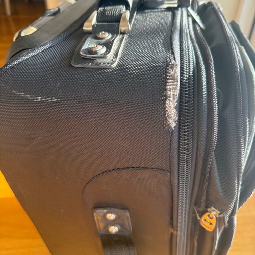 Delsey suitcase used with wheels small size black