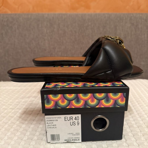 Kurt Geiger black leather sandals with gold emblem, size 40