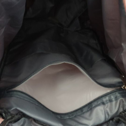 Barrel-shaped pink backpack