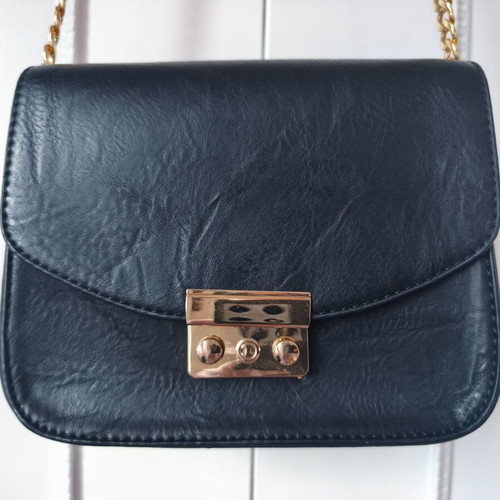 Classic black crossbody bag like new with gold chain for evening wear