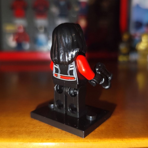 Red She-Hulk figure like new with base, two heads, and gun