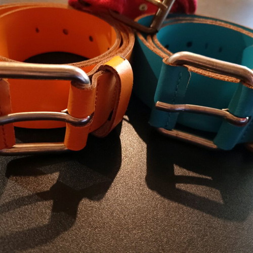 Three Benetton belts used, two leather and one fabric