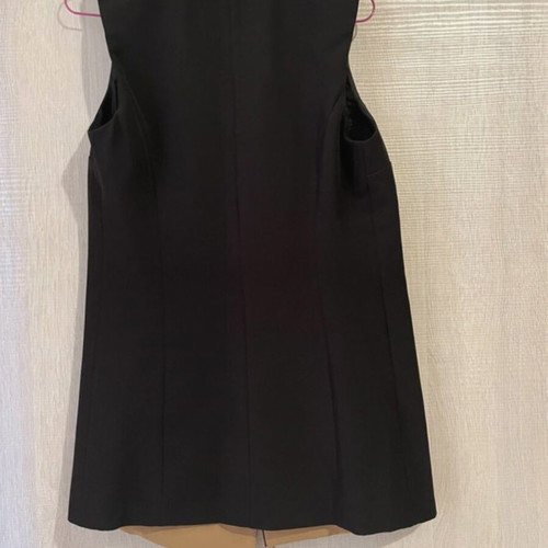 Sleeveless jacket used, black and tan, size small