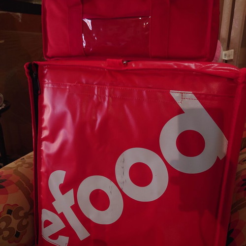 Delivery equipment set new with efood and Wolt shoes, gloves, jacket, and accessories