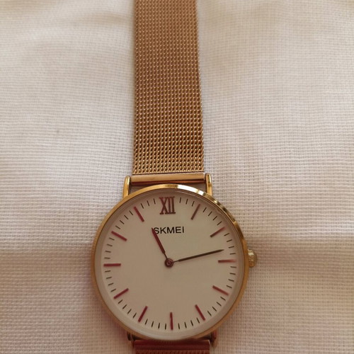 Skmei women's watch used, pink gold, metal bracelet