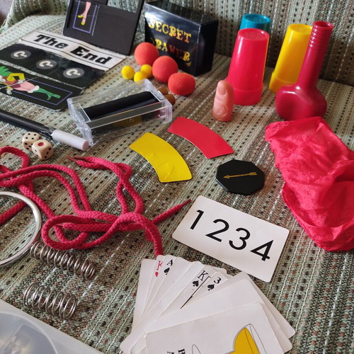 Magic trick game used with 120 tricks and DVD instructions