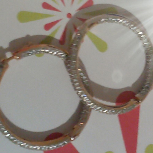 Gold hoop earrings with zircon stones