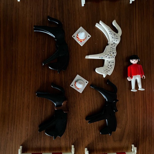 Playmobil like new with 1 figure, 4 horses, 4 obstacles, 2 cones