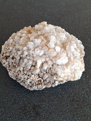 Calcite crystal from Lavrion mines on ankerite base