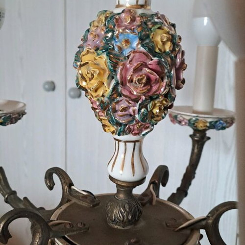 Vintage ceiling chandelier used with brass wall sconces and porcelain