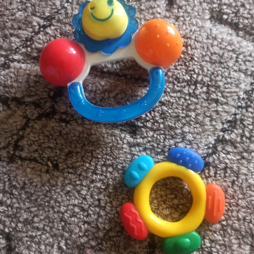 Teether and rattle with handle