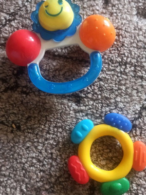 Teether and rattle with handle