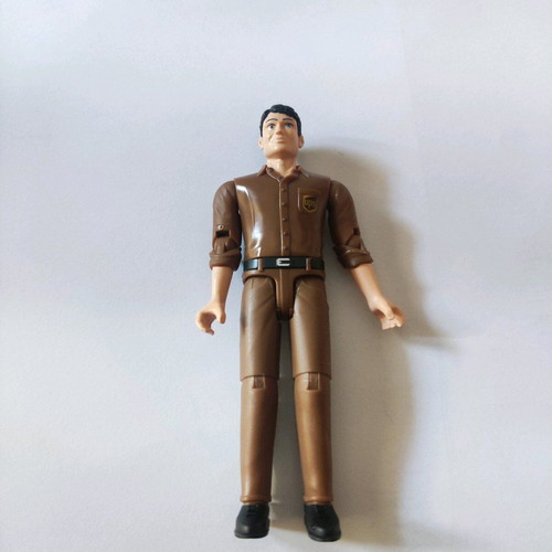 Bruder UPS driver figure collectible, like new, scale 1:16