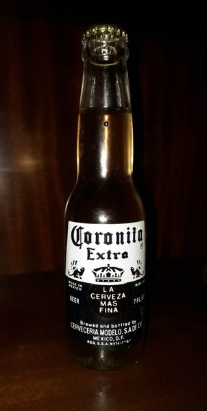 #КОЛЕКЦИОННА БИРА Corona - Coronita Extra 7oz. Винтидж, ЗАПЕЧАТАНА - НЕОТВАРЯНА, в оригинално състояние.