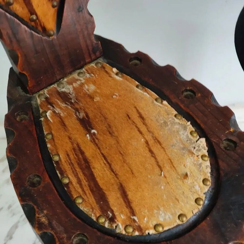 Spanish rustic chair used with three legs and animal leather