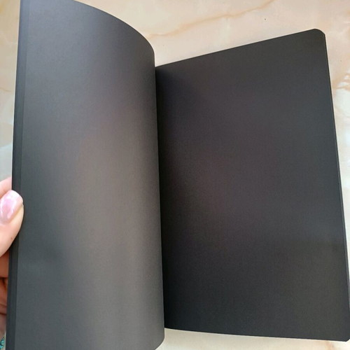 Notebook like new with black inner pages