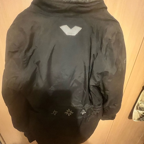 Women's motorcycle jacket used with lining and protectors