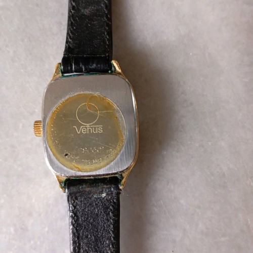 Venus women's watch like new with black leather strap and gold details