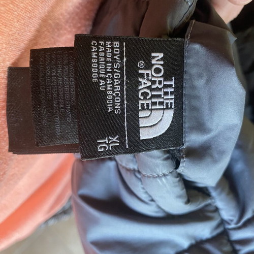 The North Face jacket used, reversible, size S, black and gray