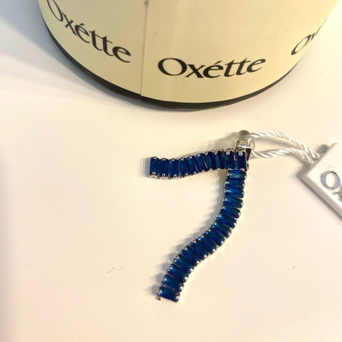 Oxette earrings with blue crystal unused