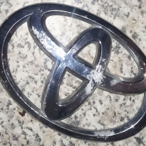 Vintage Toyota car emblem