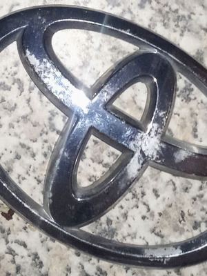 Vintage Toyota car emblem