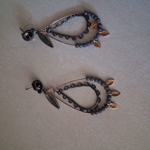 Earrings used black with gold accents