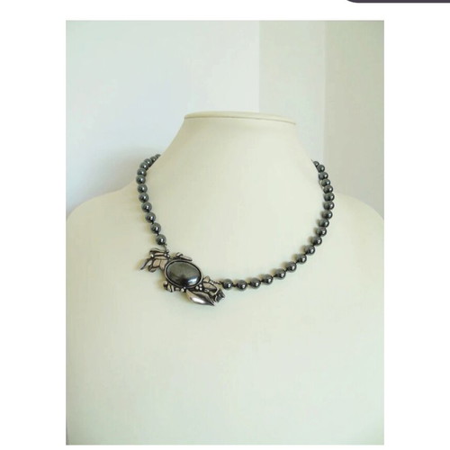 Vintage necklace with hematite beads and motif-pin used, gray
