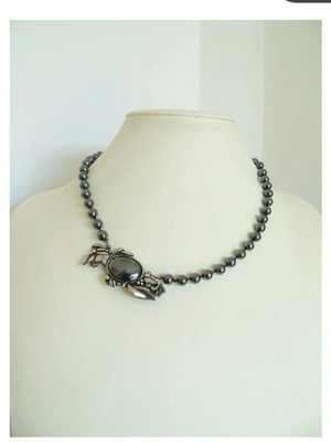 Vintage necklace with hematite beads and motif-pin used, gray