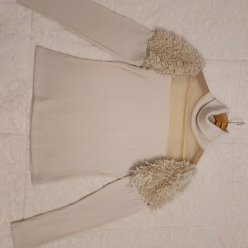 Brigitte Boutique beige blouse with turtleneck and decorative details, like new