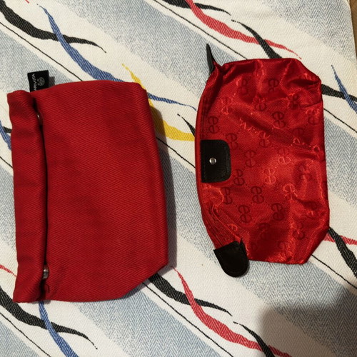 Red toiletry bags like new, set of 2, Apivita and Everyday